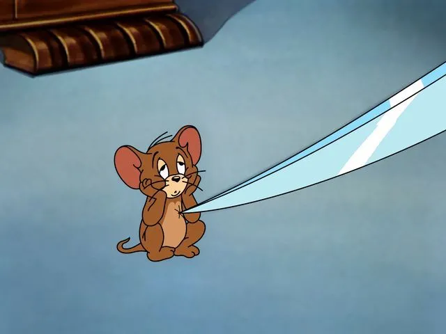 Ảnh Jerry thẫn thờ nhìn ra cửa sổ buồn.